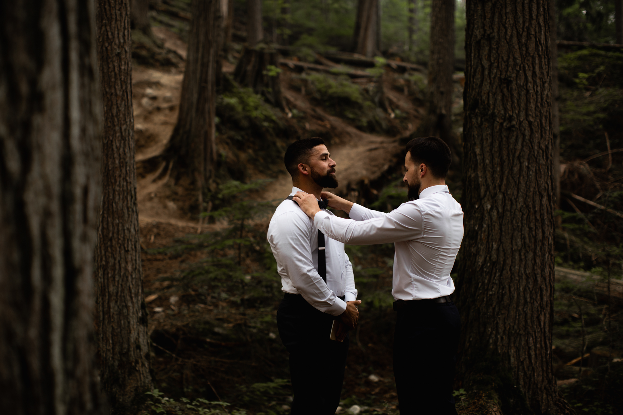 groom getting ready in forest