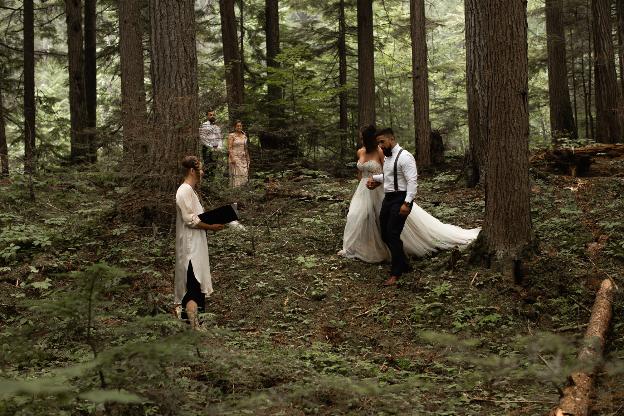 bride and groom walking to elopement ceremony