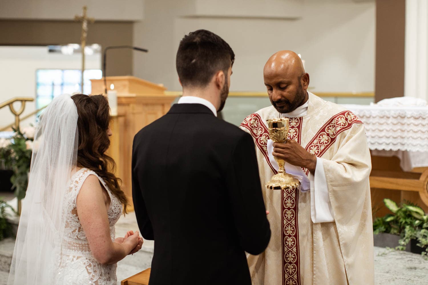 bride and groom communion