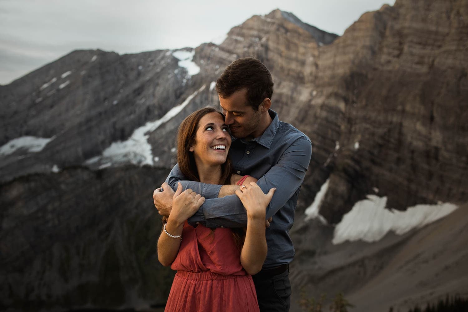 Couple at sunrise in the mountains