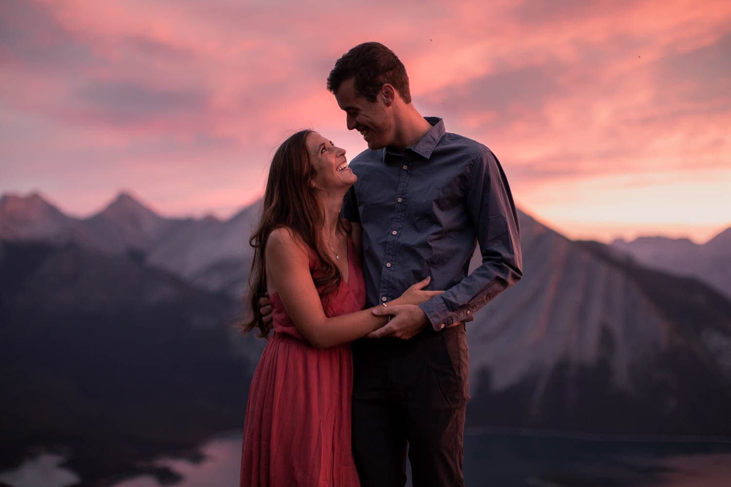 Couple at sunrise in the mountains