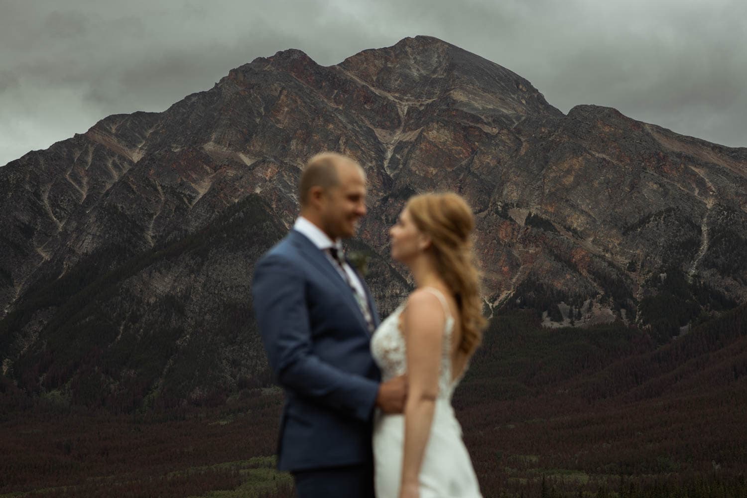 bride and groom mountain portrait