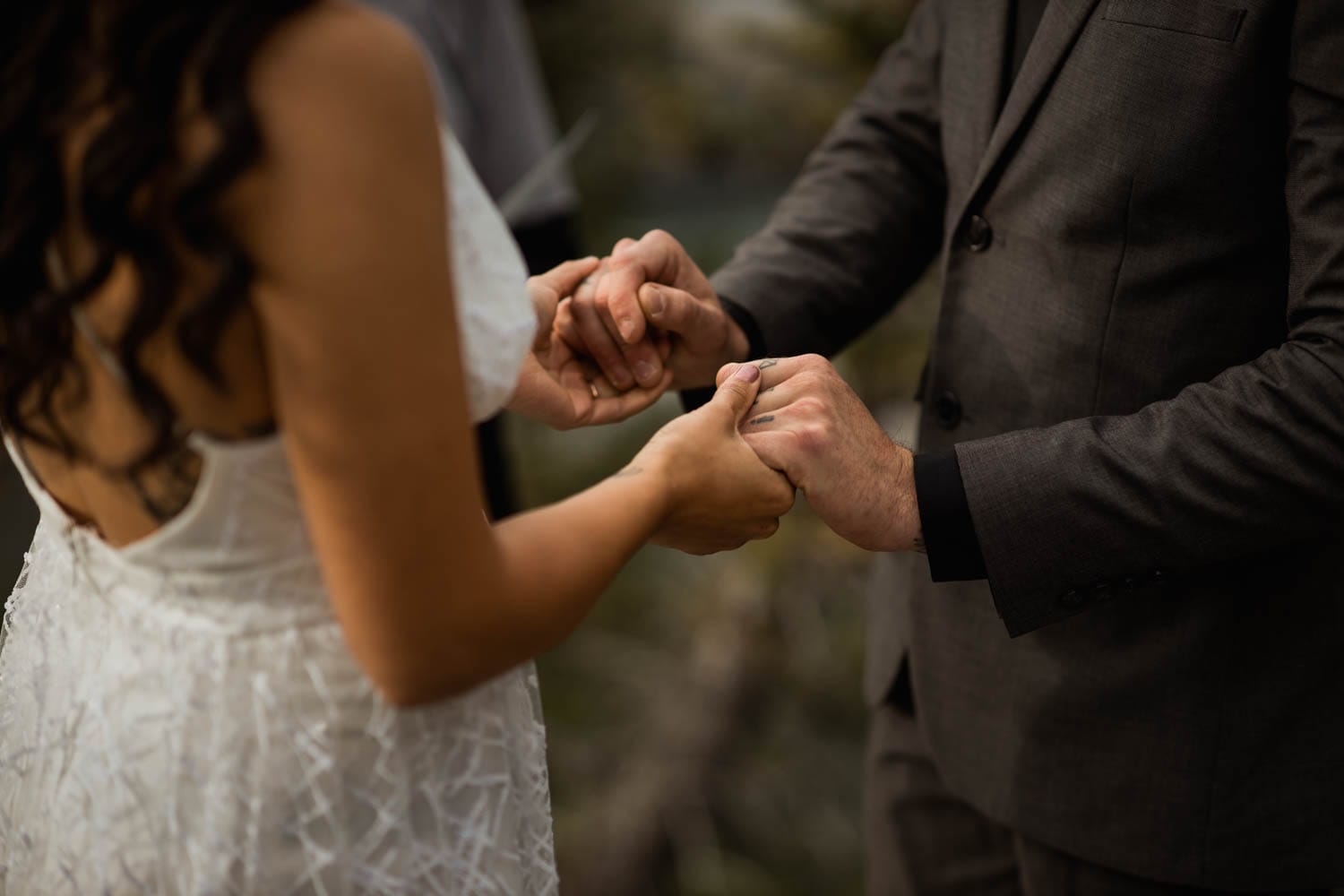 Bride and Groom holding hands