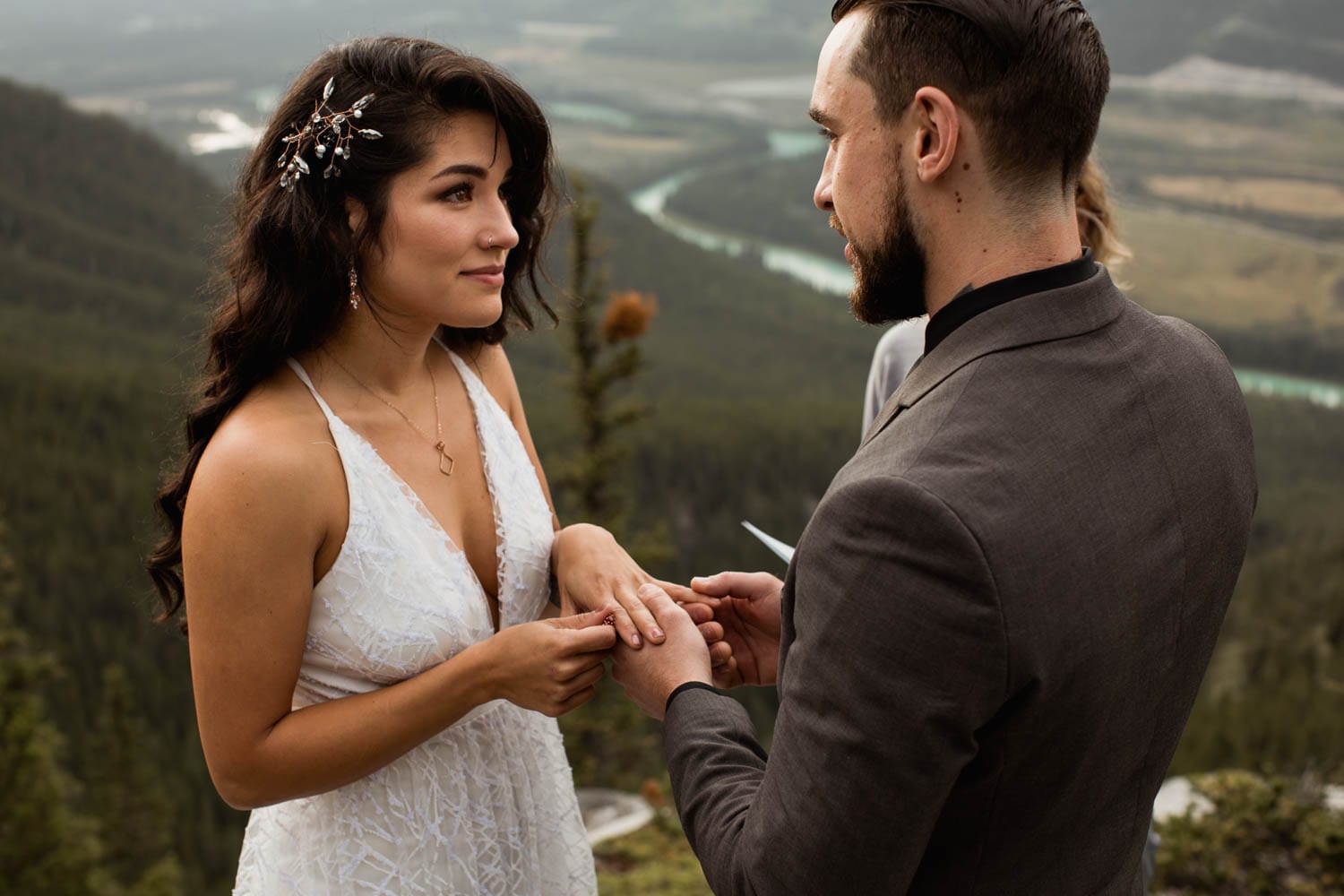 exchanging rings on top of mountain