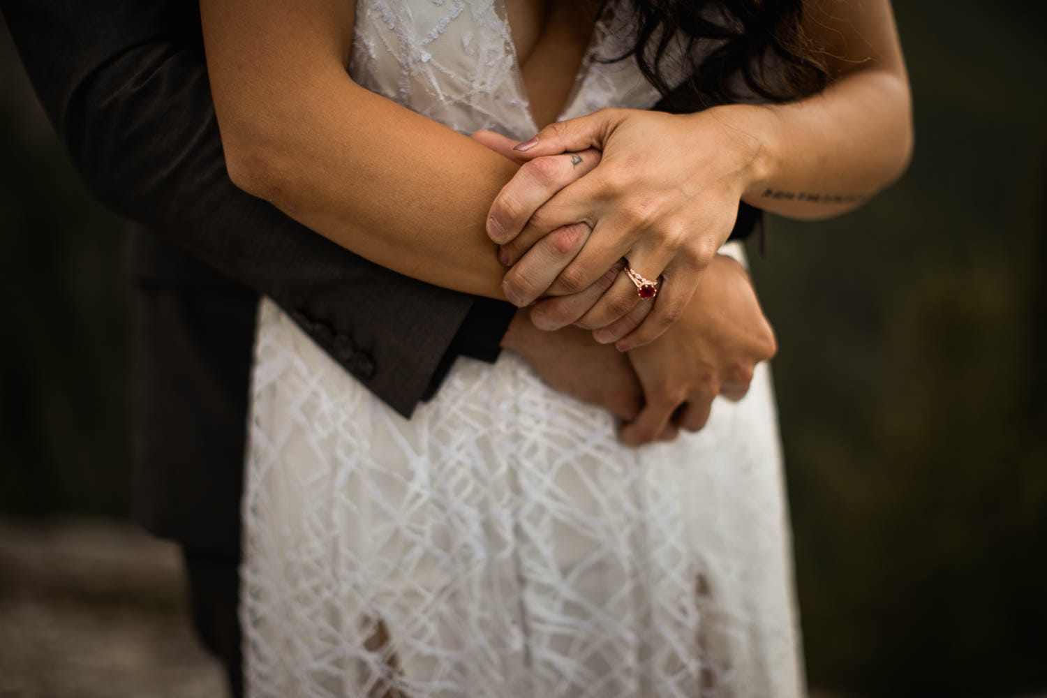 bride and groom holding hands