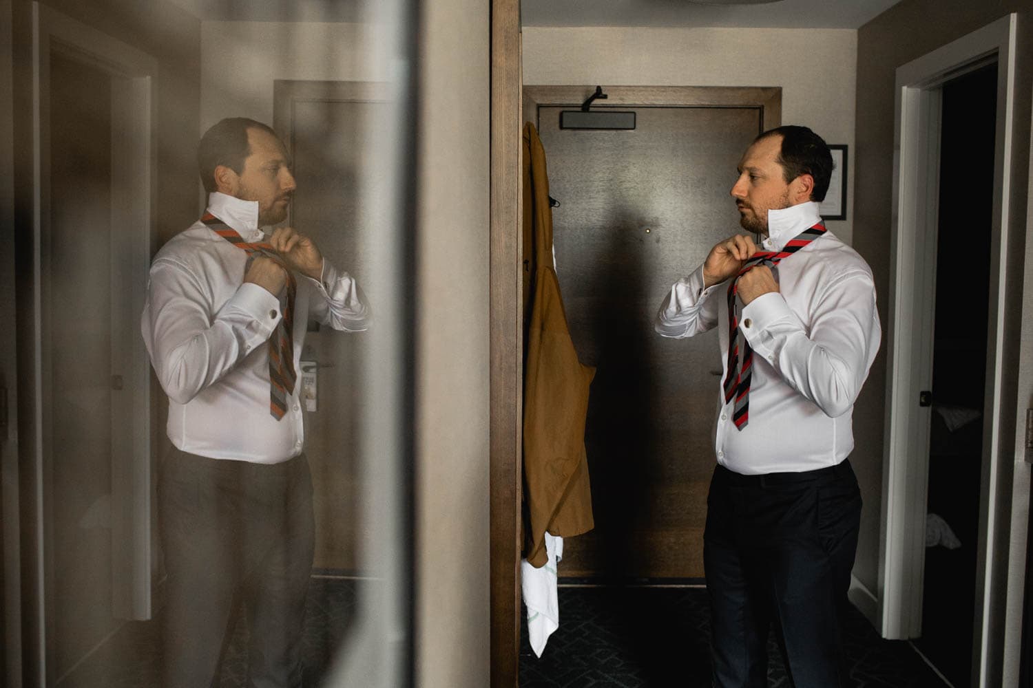 groom getting ready in Canmore