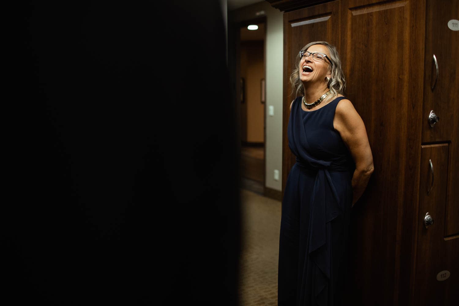 Mother of the groom laughing