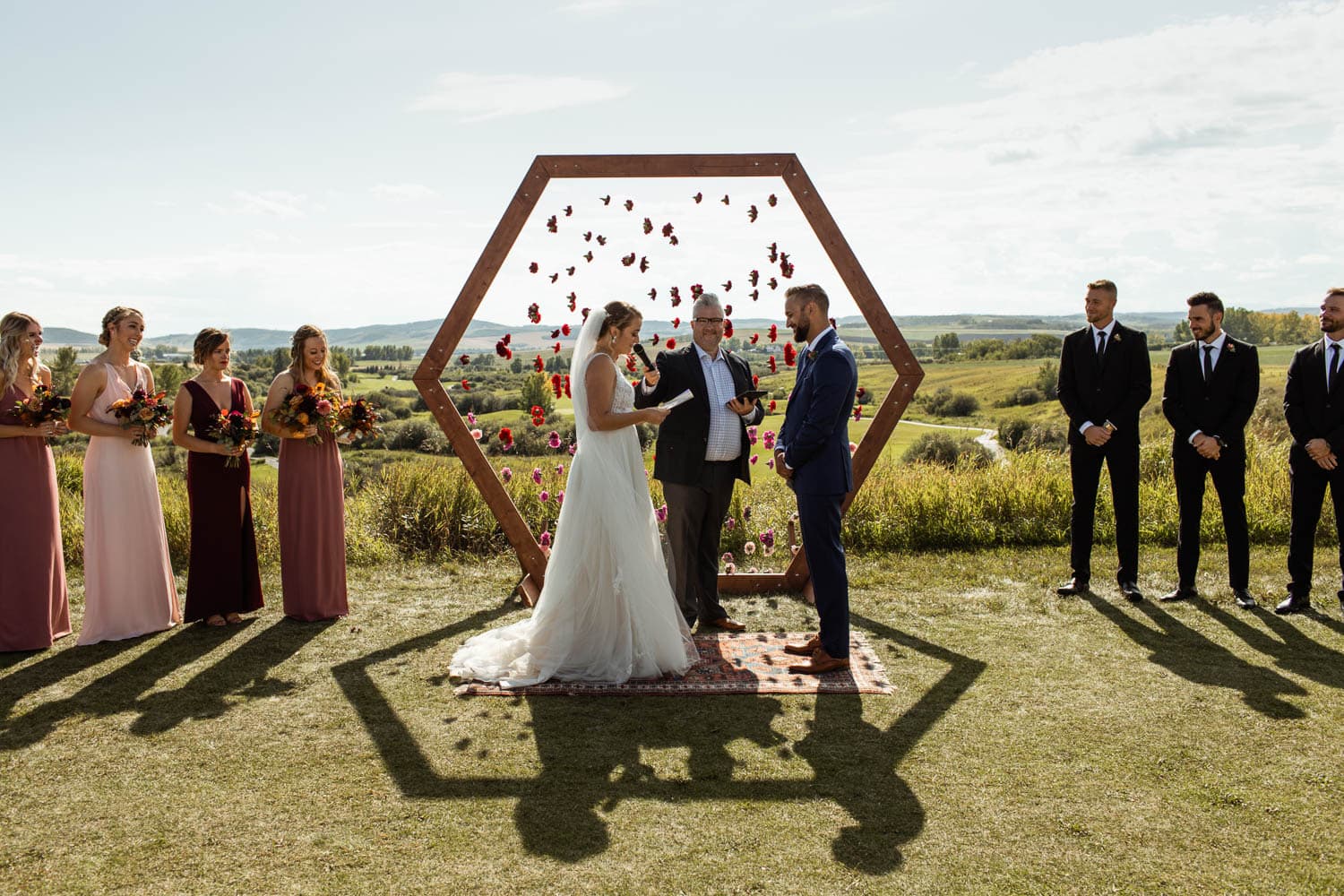 bride reading vows at wedding ceremony