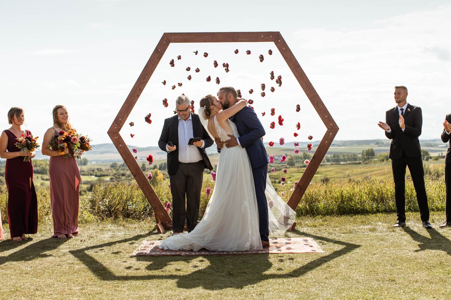 bride and groom first kiss