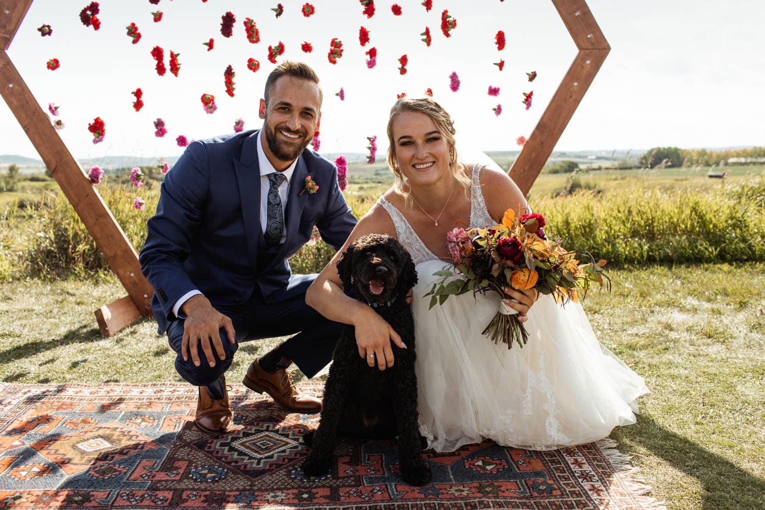 bride and groom portrait with dog