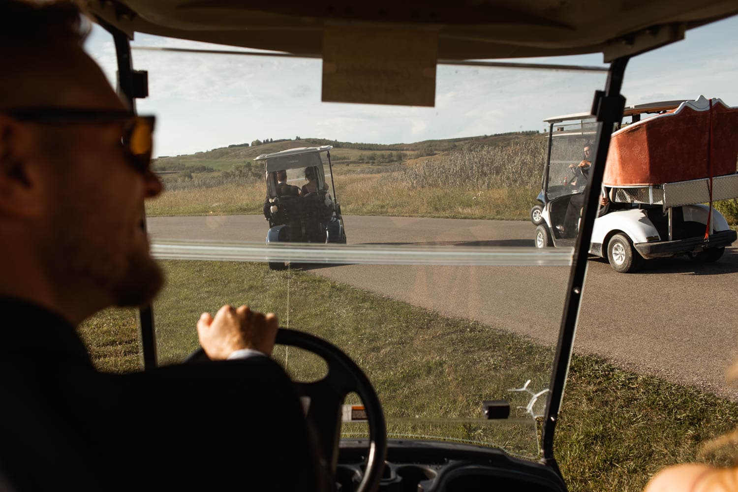 groom in golf cart