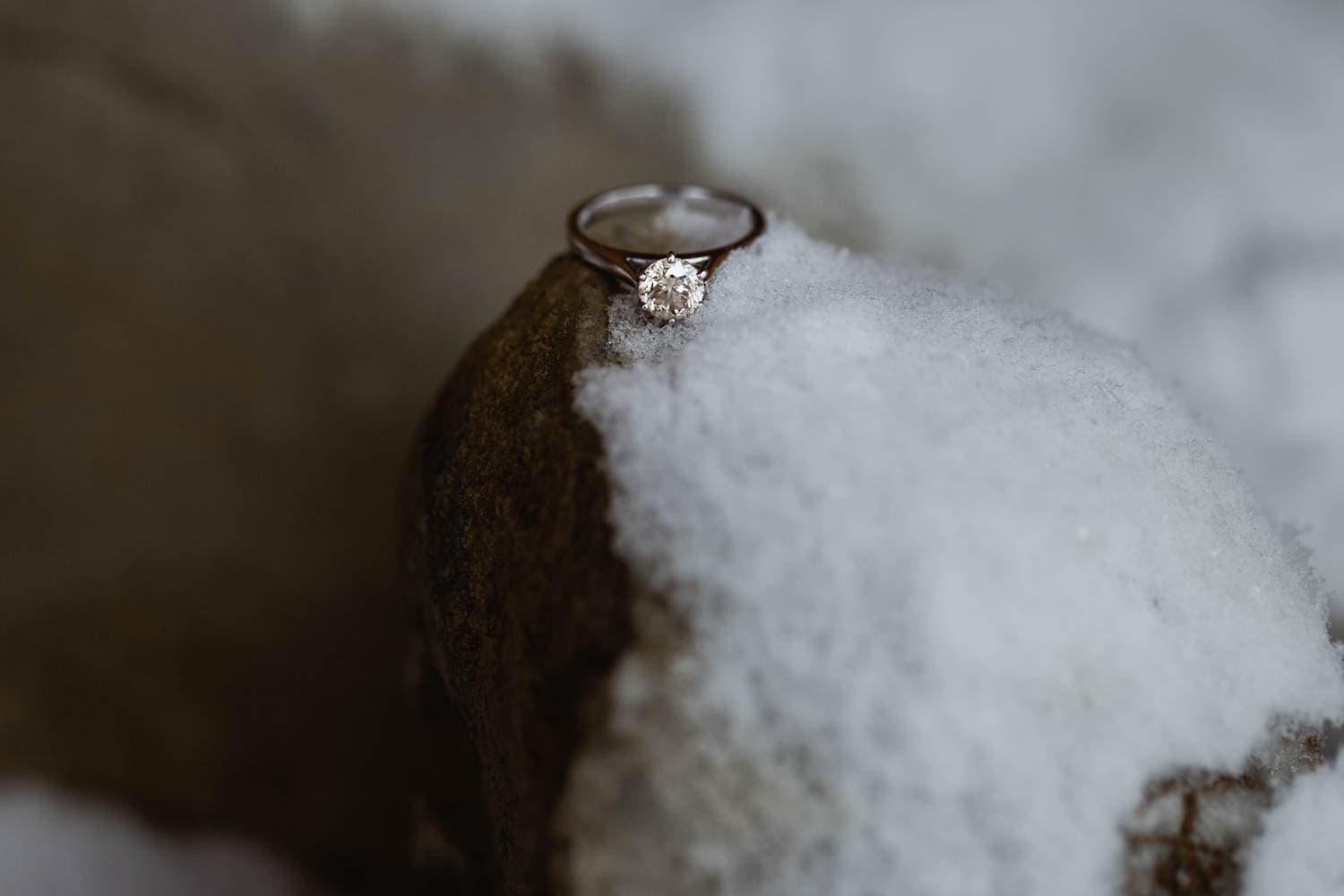 Engagement ring on snow