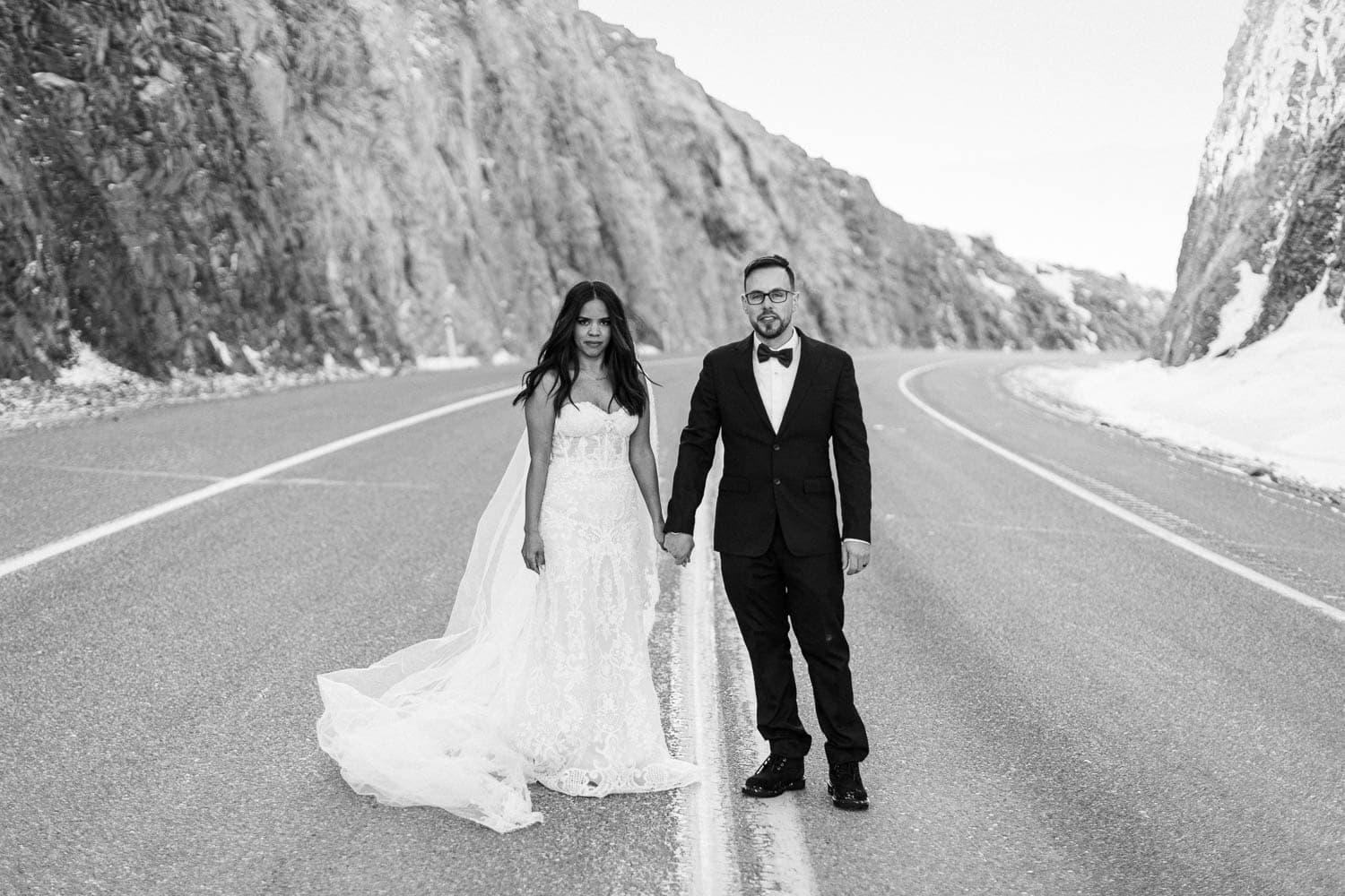bride and groom on road